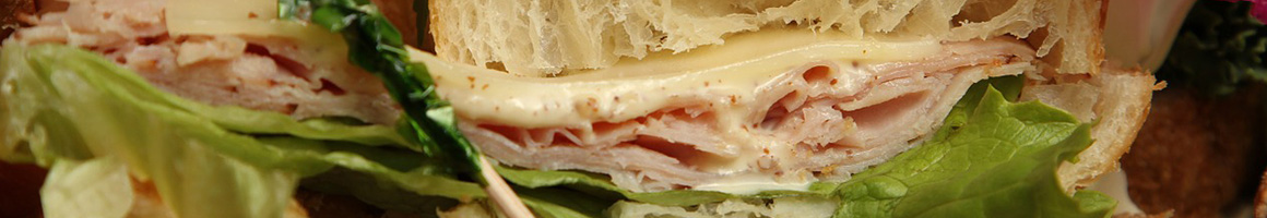 Eating Breakfast & Brunch Sandwich at Bagels Plus restaurant in Queens, NY.